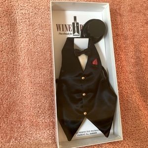 Wine butler.  Vintage fine threads for your whites and reds.